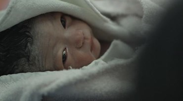 neonato in fasce